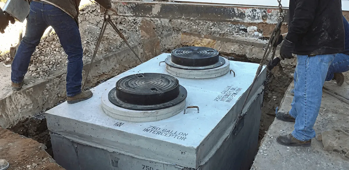 Grease trap installation for a commercial property drainage system in New Haven, CT