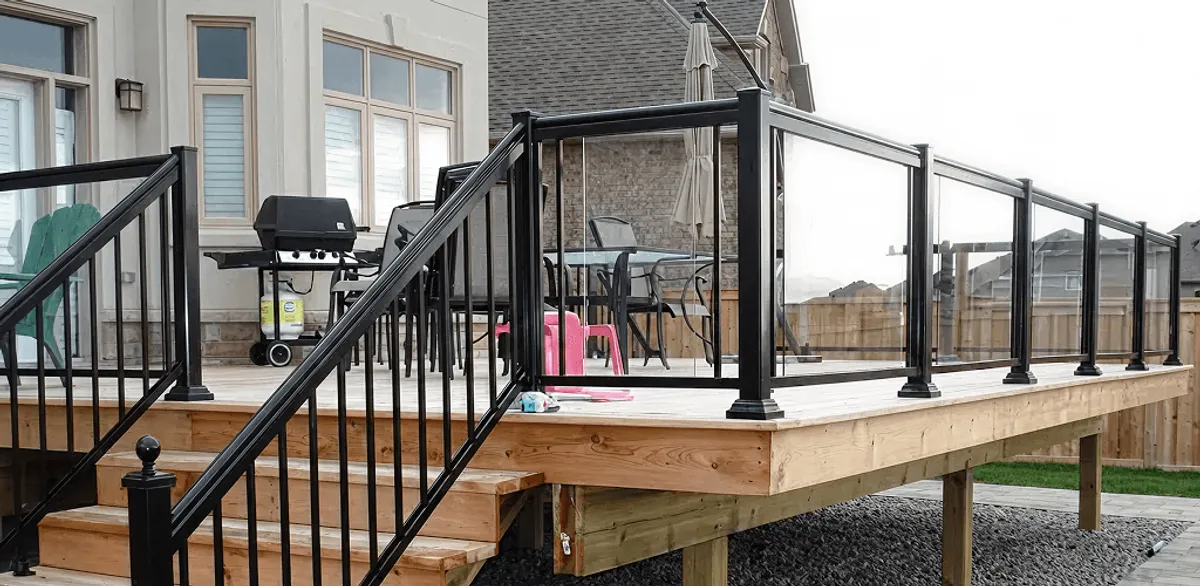 Handrail installation on a deck staircase for safety and code compliance in New Haven, CT