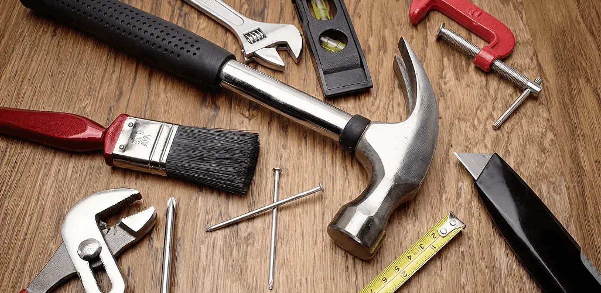 Handyman tools laid out for home repair and maintenance work in New Haven, CT