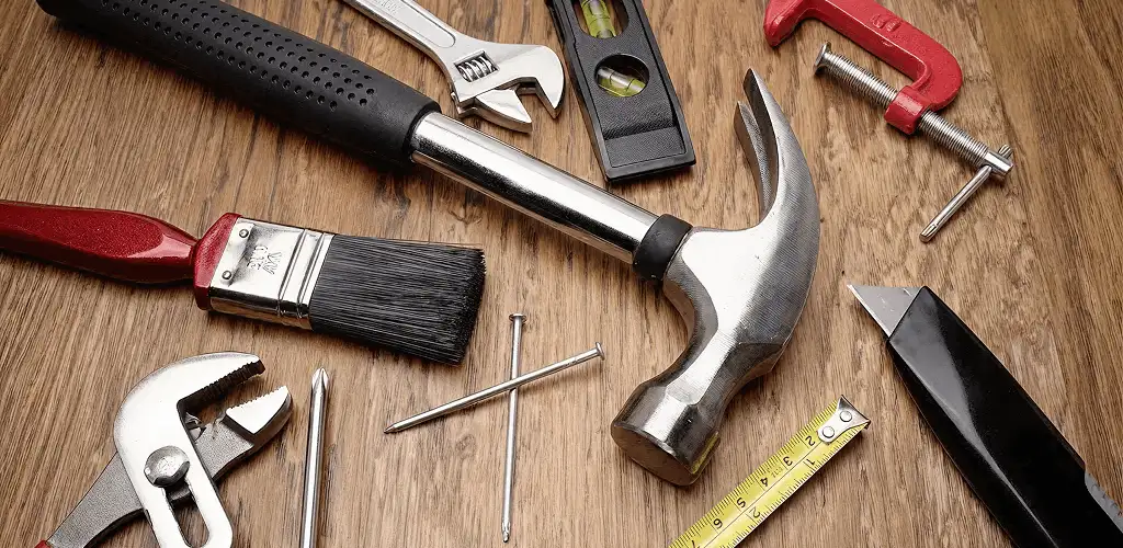 Handyman tools laid out for home repair and maintenance work in New Haven, CT
